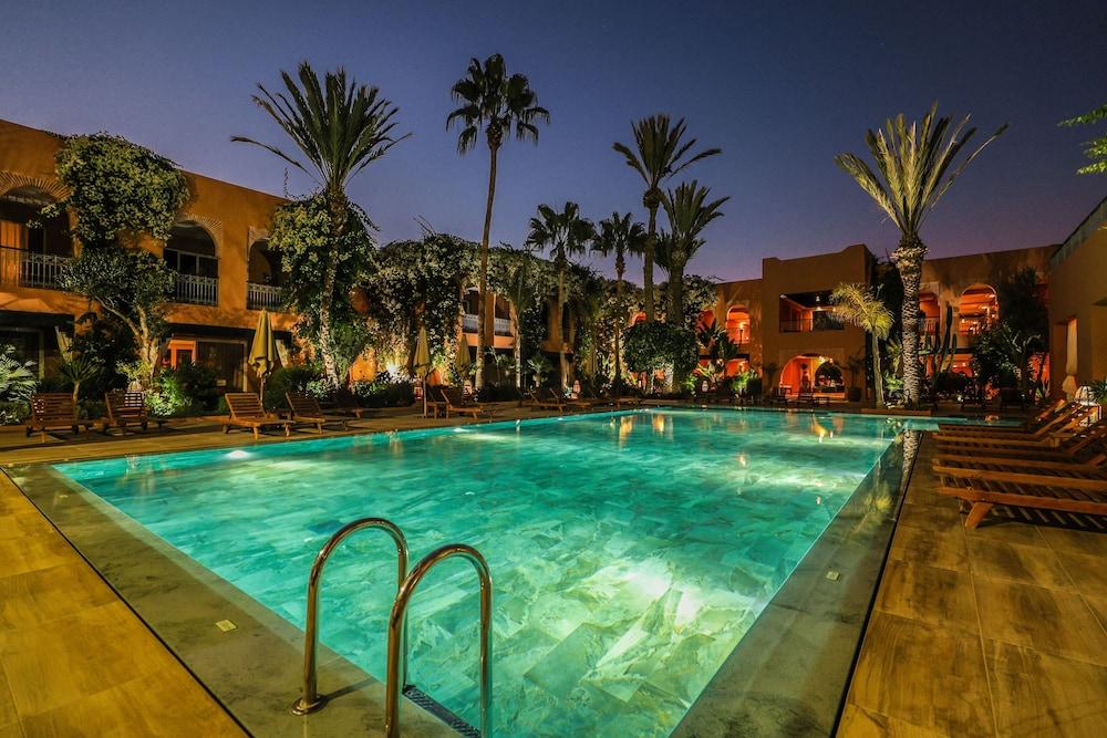 Tikida Golf Palace Agadir Dış mekan fotoğraf The swimming pool at the hotel