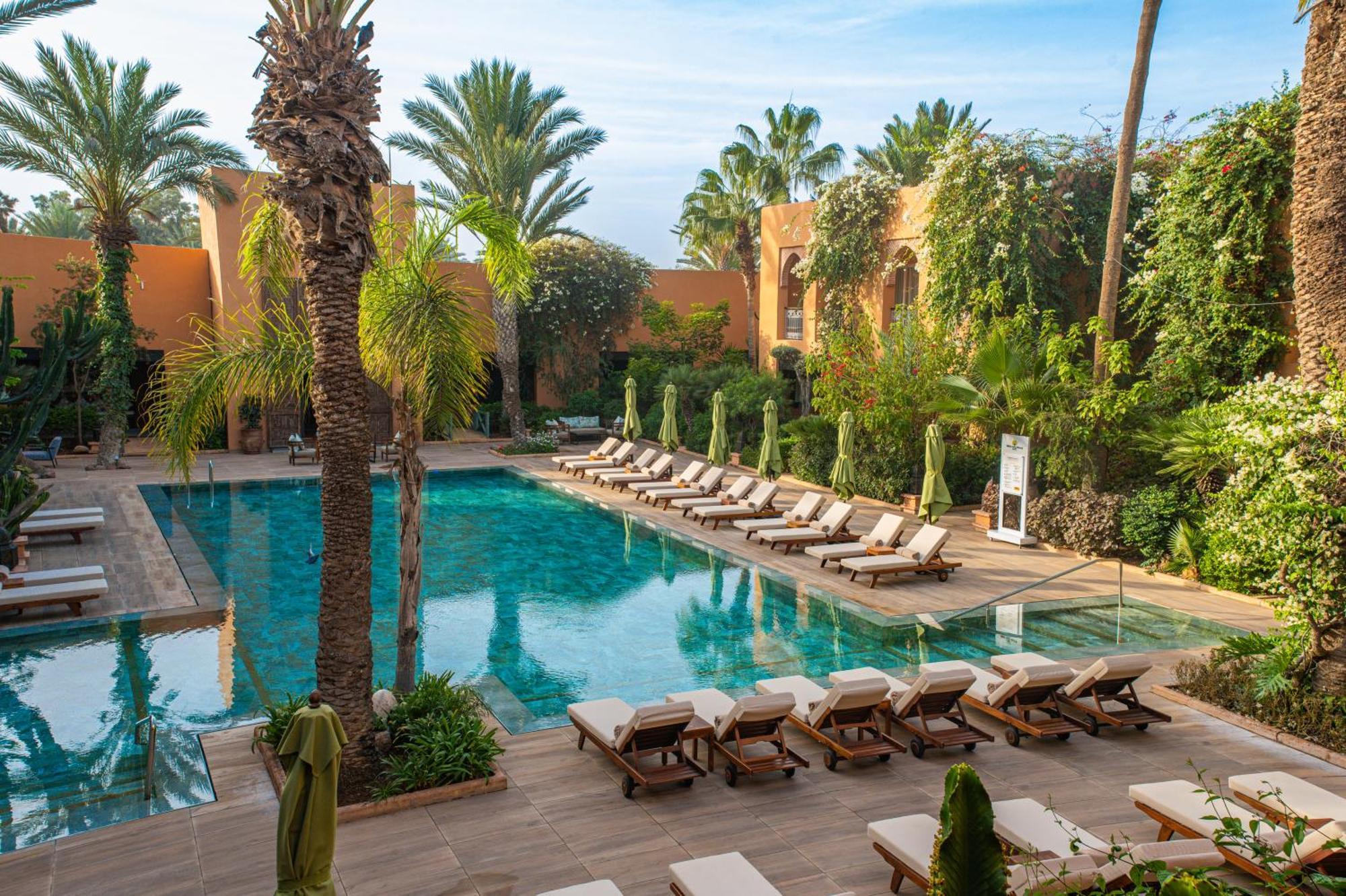 Tikida Golf Palace Agadir Dış mekan fotoğraf The swimming pool at the hotel