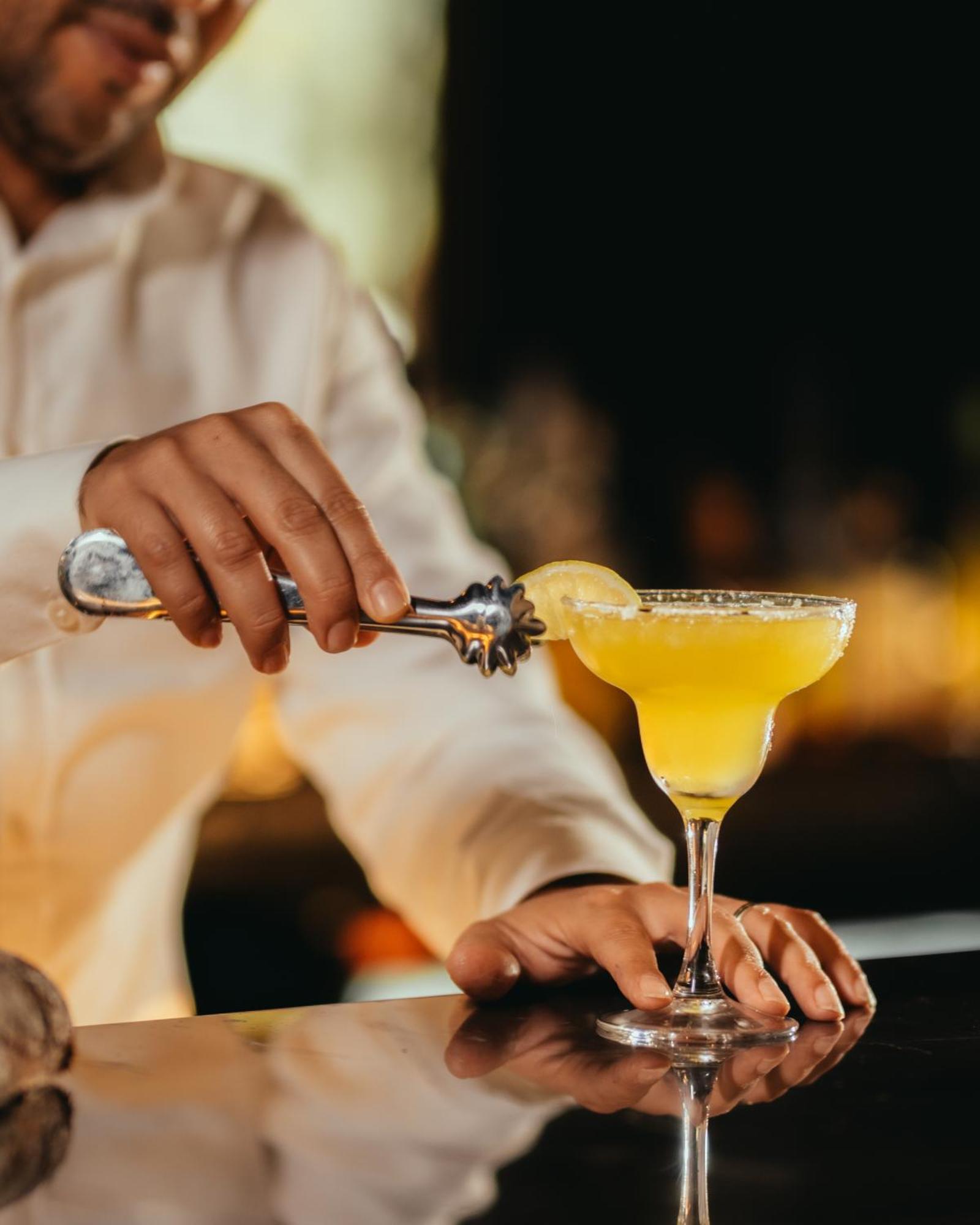 Tikida Golf Palace Agadir Dış mekan fotoğraf A margarita being garnished with a lime